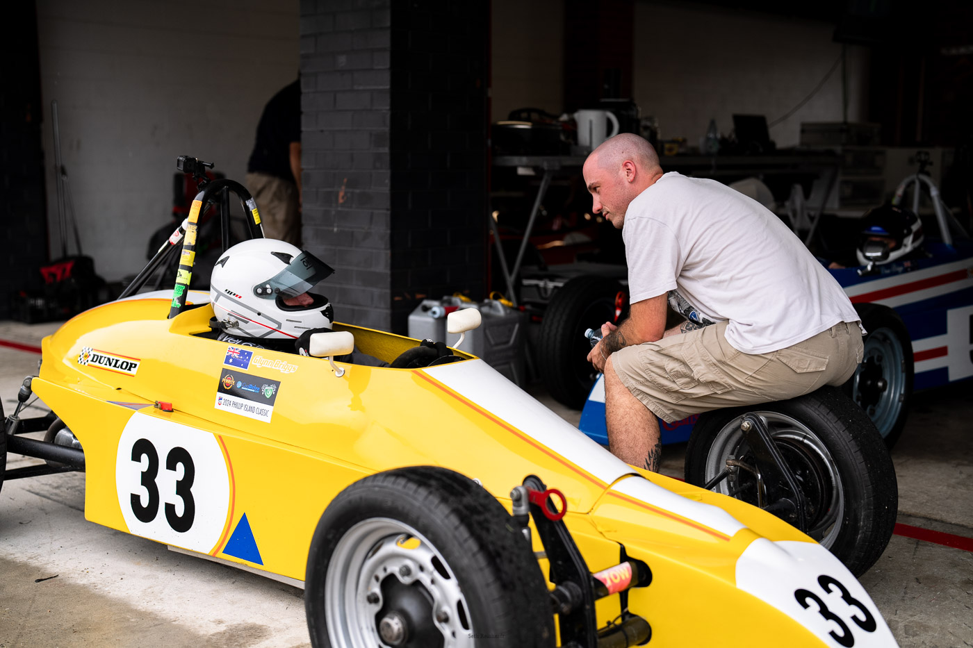 Glynn Briggs chatting before going out in the 1983 Spectre Formula Vee